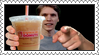 A stamp of Jerma holding a Dunkin Donuts drink and pointing to the camera.